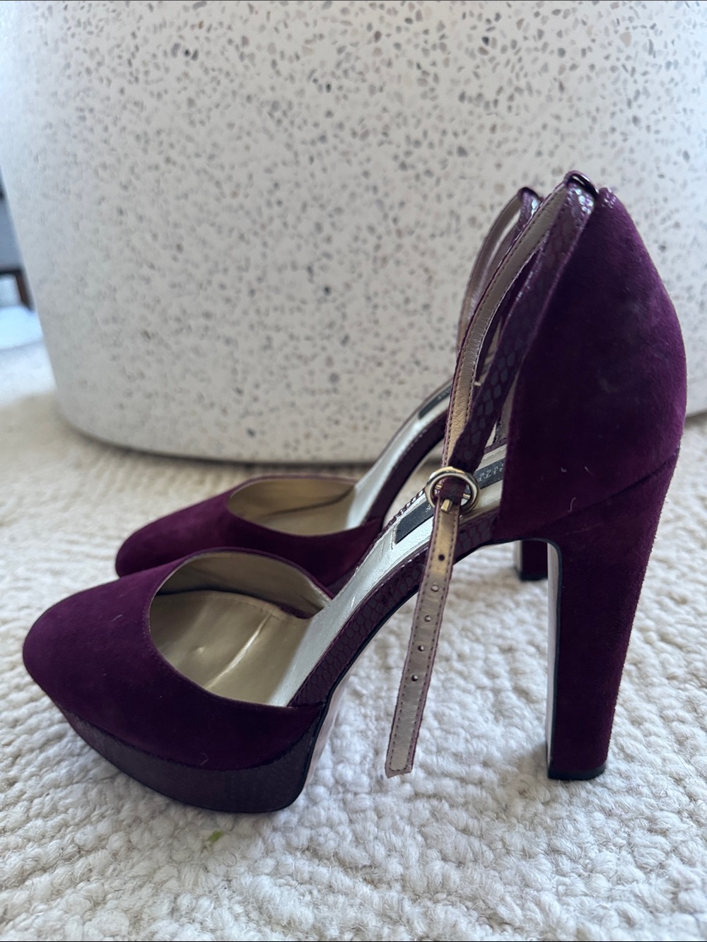 Women’s Suede Ankle-Strap Platform Pumps with snake skin detail.